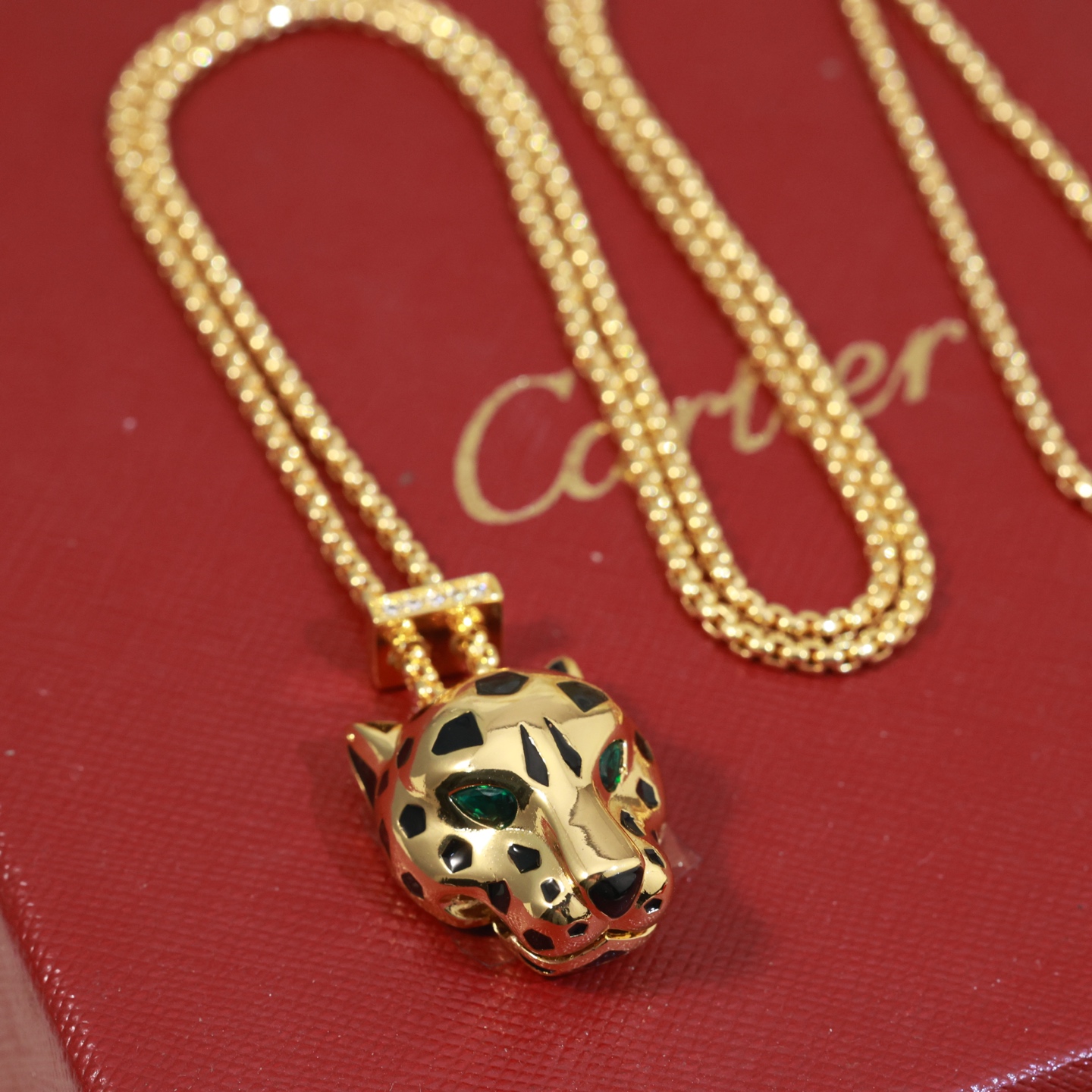 Cartier Panthere de Cartier necklace 18k yellow gold black lacquer green tsavorite garnet diamond accents 42cm