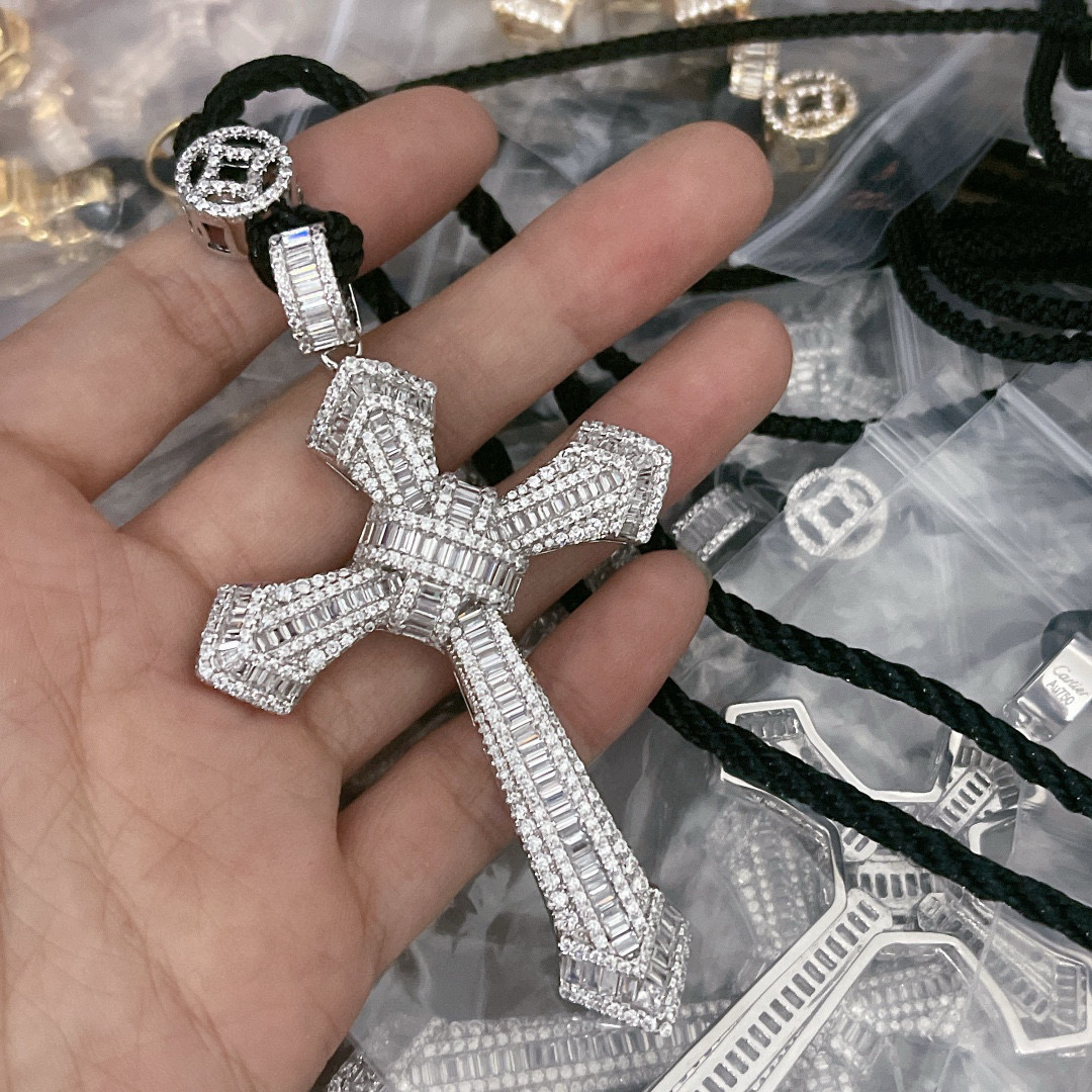 Cartier Diamond Cross Pendant pendant White gold with clear baguette and round diamonds black cord 24 inch black cord chain