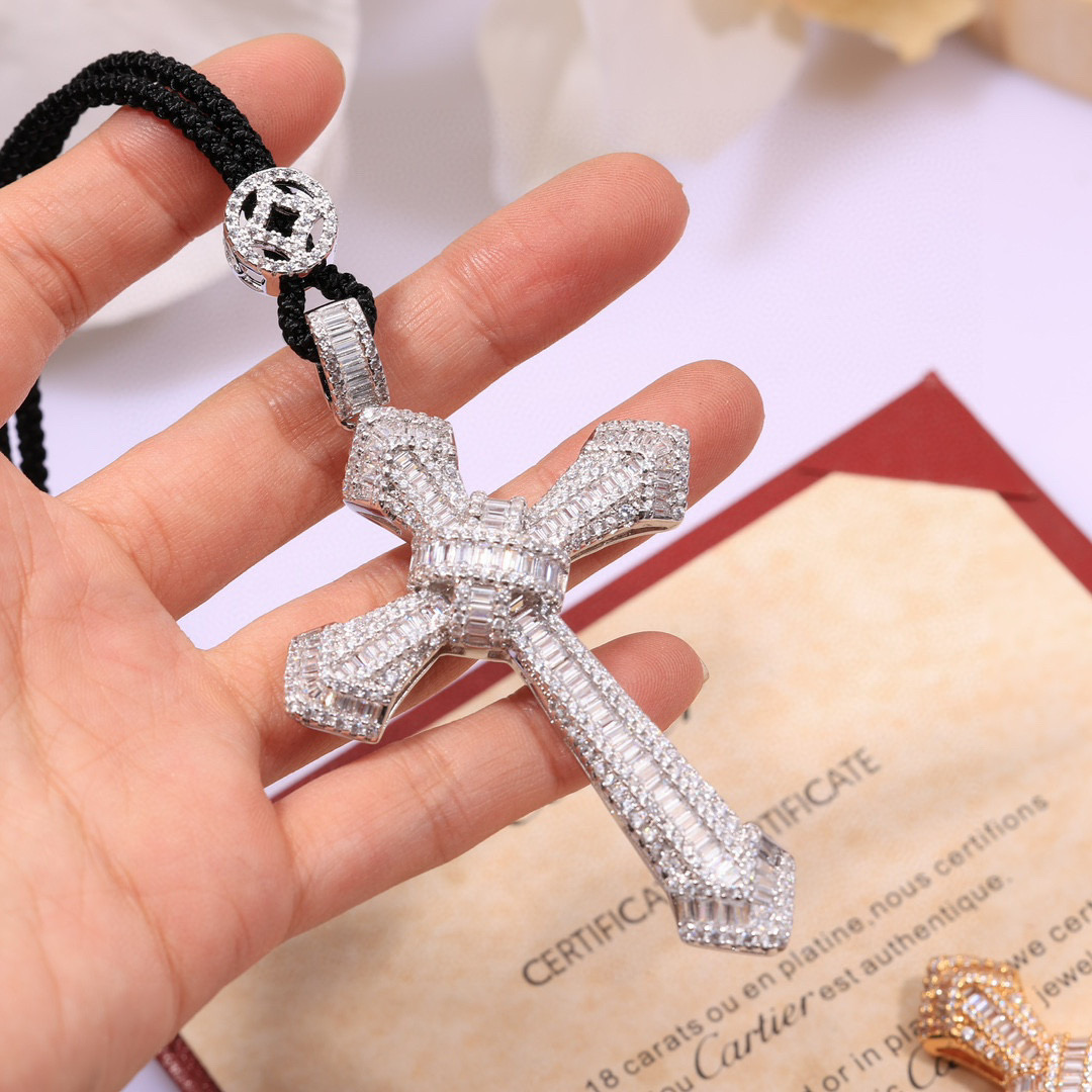 Cartier Diamond Cross Pendant pendant White gold with clear baguette and round diamonds black cord 24 inch black cord chain