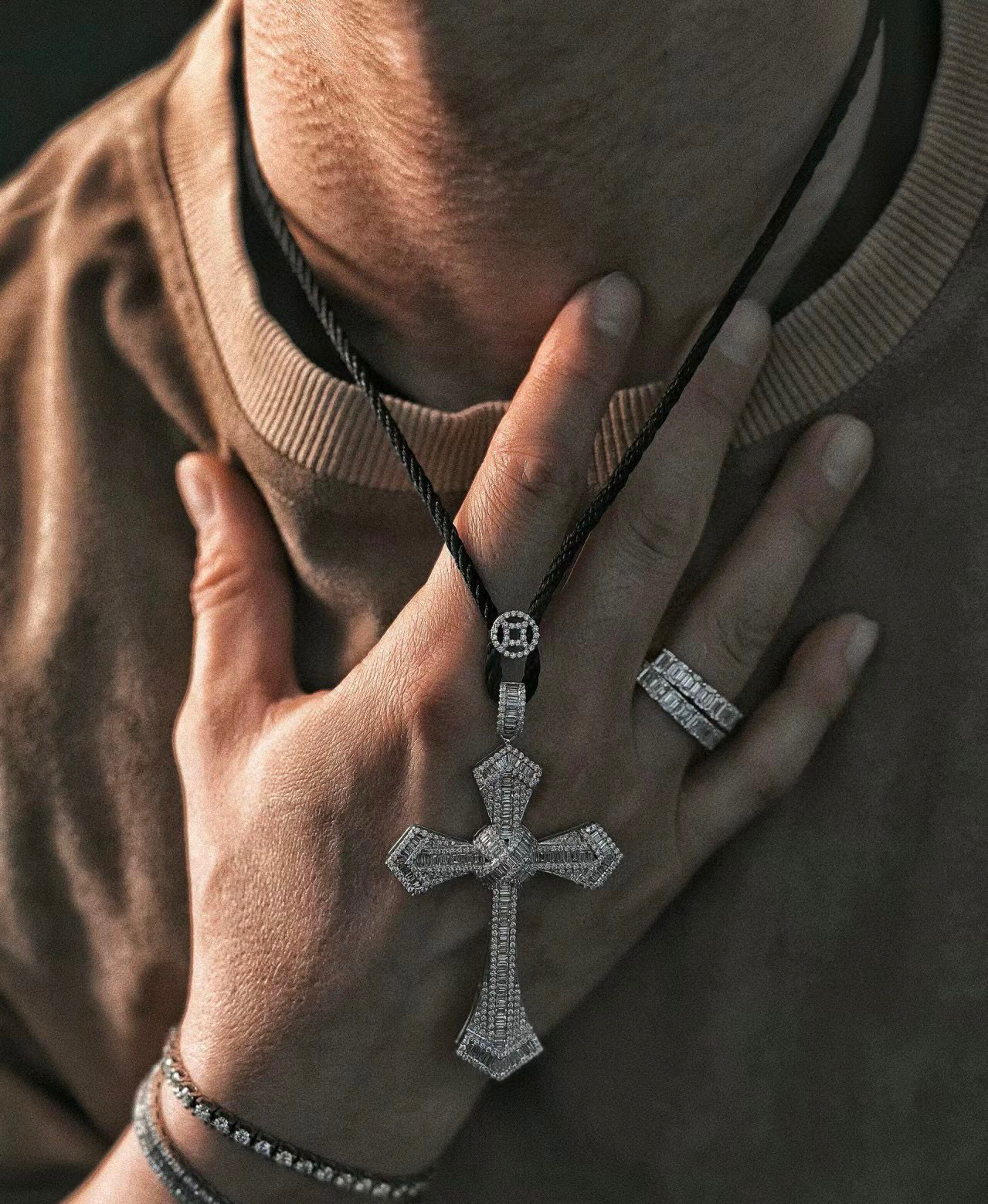 Cartier Diamond Cross Pendant pendant White gold with clear baguette and round diamonds black cord 24 inch black cord chain