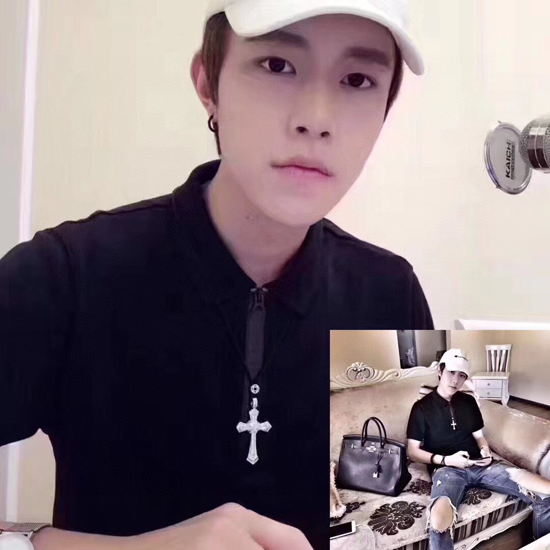 Cartier Diamond Cross Pendant pendant White gold with clear baguette and round diamonds black cord 24 inch black cord chain