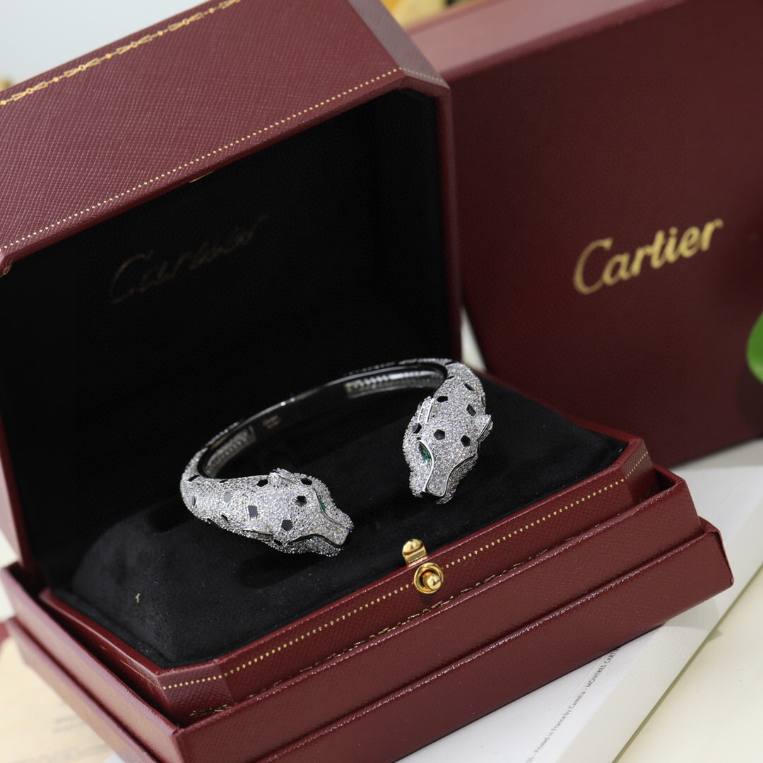 Cartier Panthere de Cartier bracelet 18K yellow gold 18K rose gold 18K white gold pave-set white diamonds black onyx spots emerald eyes black onyx nose 17cm