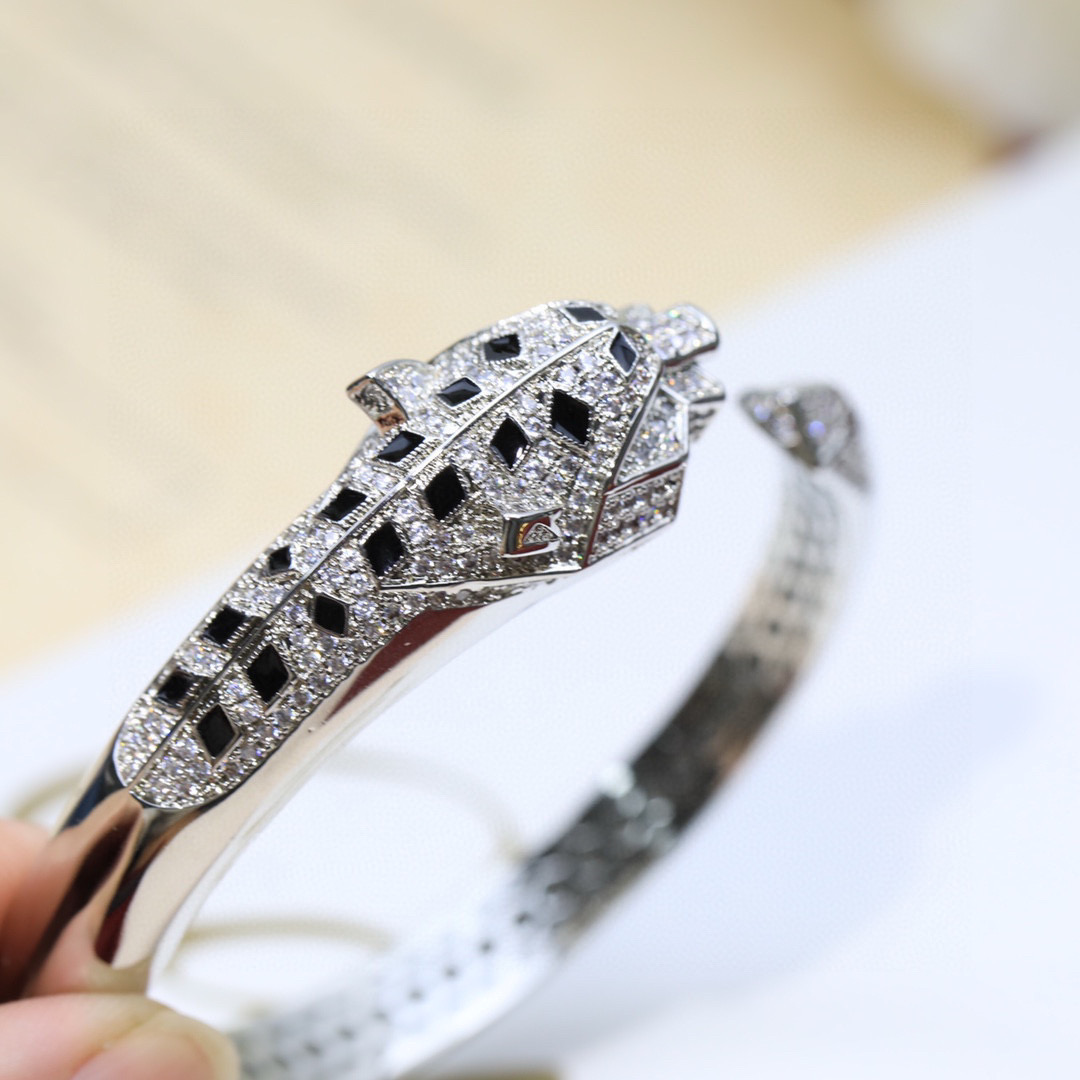 Cartier Panthere de Cartier bracelet 18K white gold set with diamonds black onyx emerald 17cm inner circumference