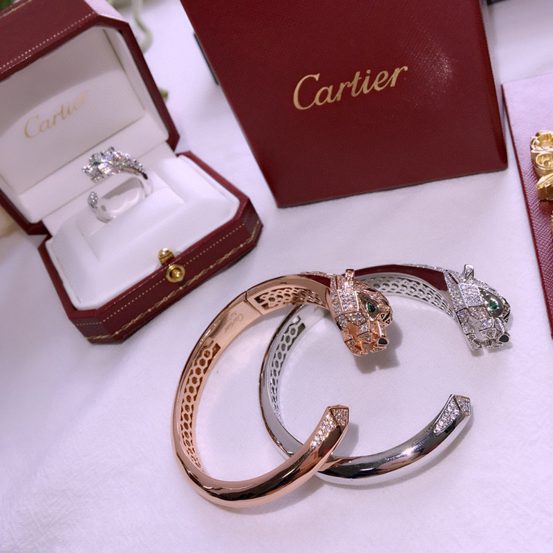 Cartier Panthere de Cartier bracelet 18k white gold 18k rose gold pave diamonds emerald eyes black onyx accents 17cm