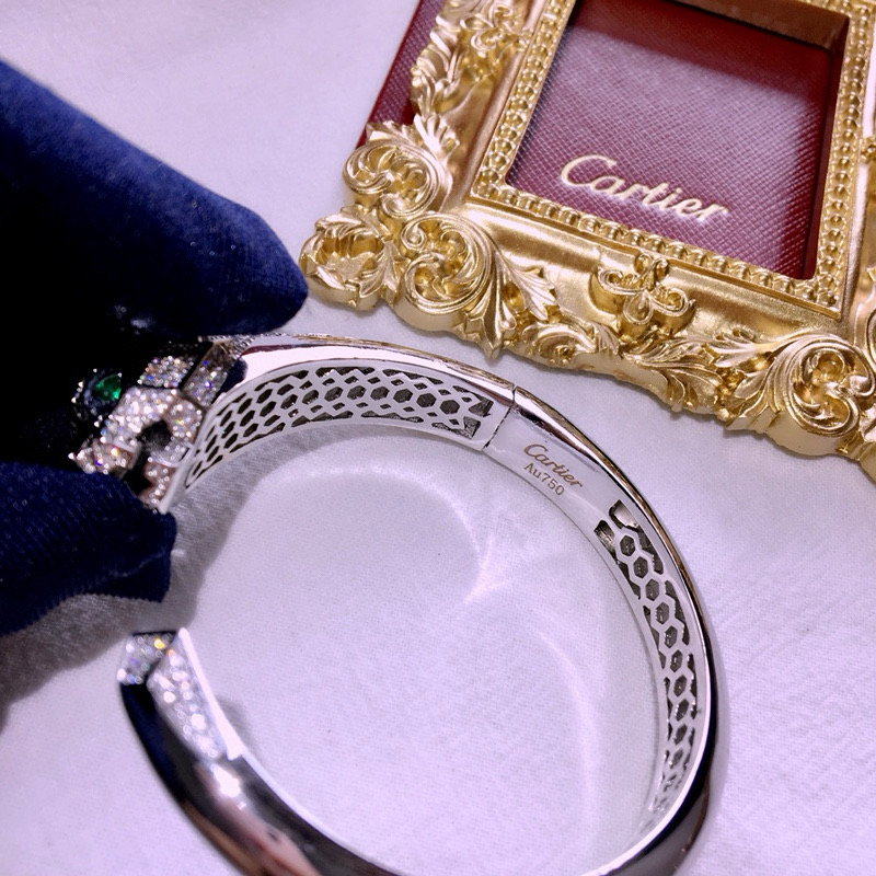 Cartier Panthere de Cartier bracelet 18k white gold 18k rose gold pave diamonds emerald eyes black onyx accents 17cm