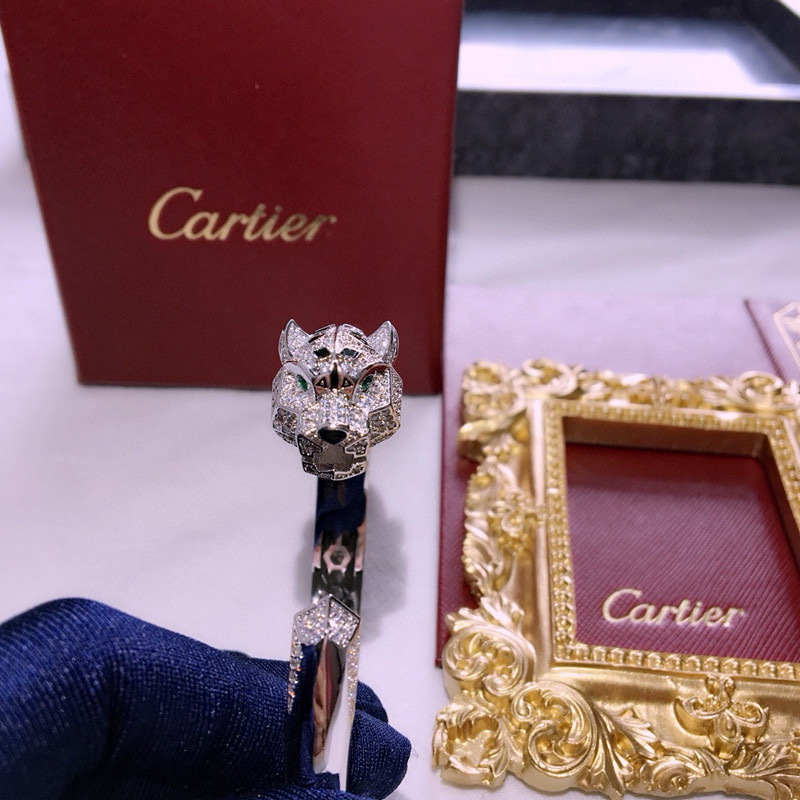 Cartier Panthere de Cartier bracelet 18k white gold 18k rose gold pave diamonds emerald eyes black onyx accents 17cm