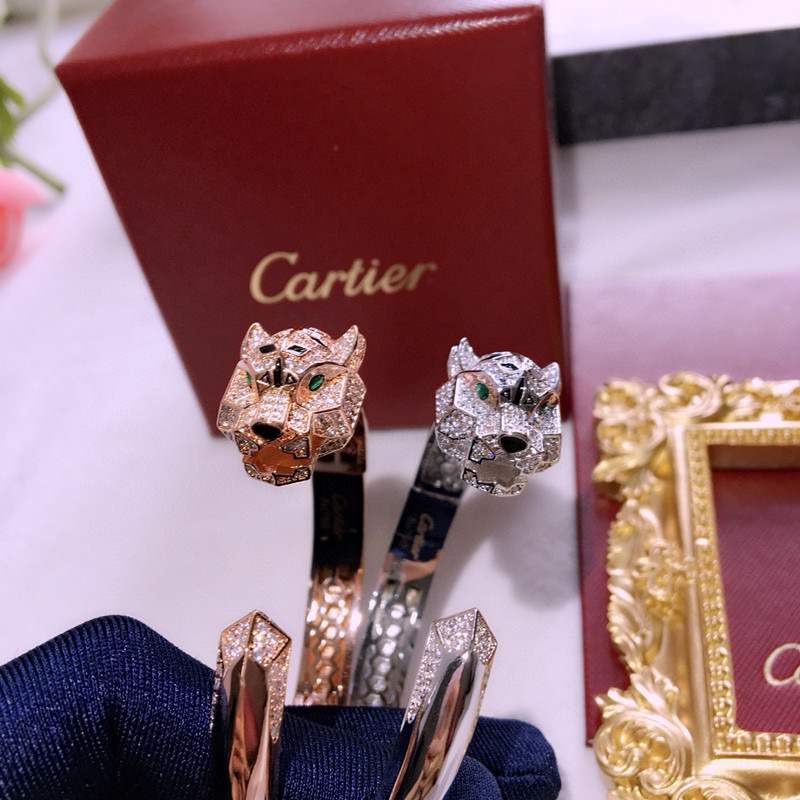 Cartier Panthere de Cartier bracelet 18k white gold 18k rose gold pave diamonds emerald eyes black onyx accents 17cm