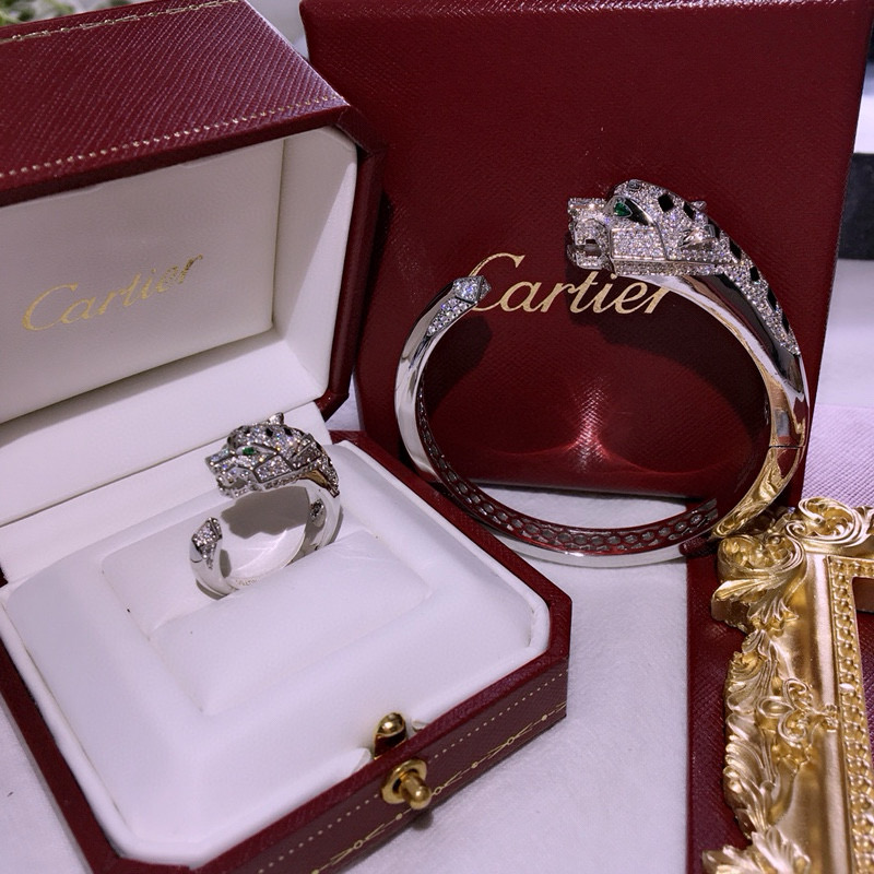 Cartier Panthere de Cartier bracelet 18k white gold 18k rose gold pave diamonds emerald eyes black onyx accents 17cm