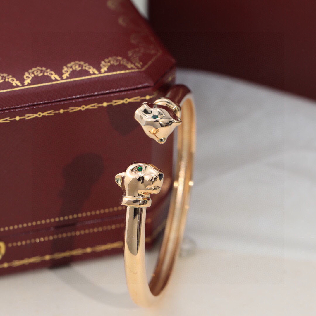 Cartier Panthere de Cartier bracelet Yellow gold with green tsavorite garnet and black onyx accents 17
