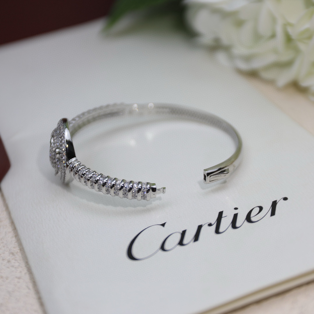 Cartier Panthere de Cartier bracelet 18K white gold pave diamonds emerald 17