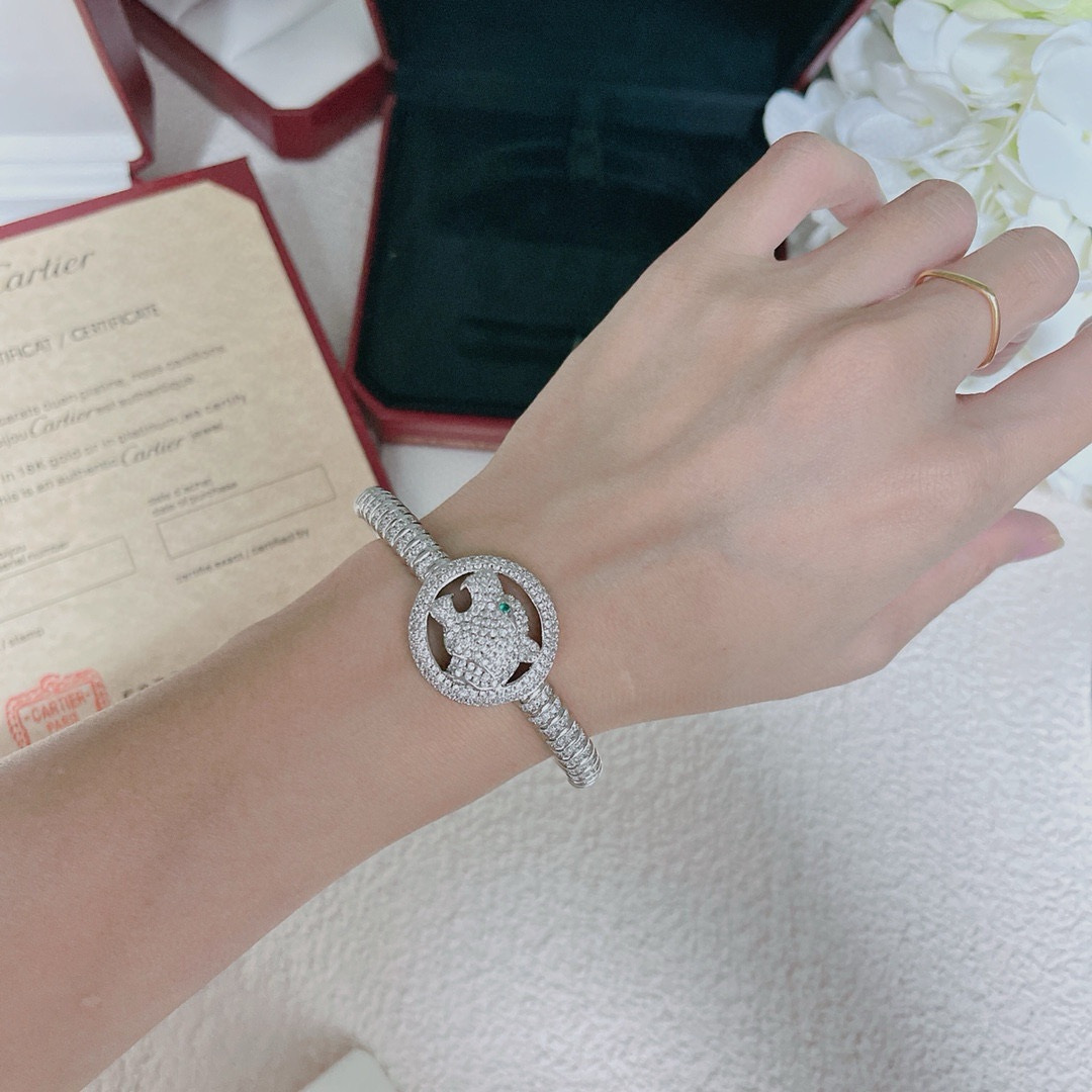 Cartier Panthere de Cartier bracelet 18K white gold pave diamonds emerald 17
