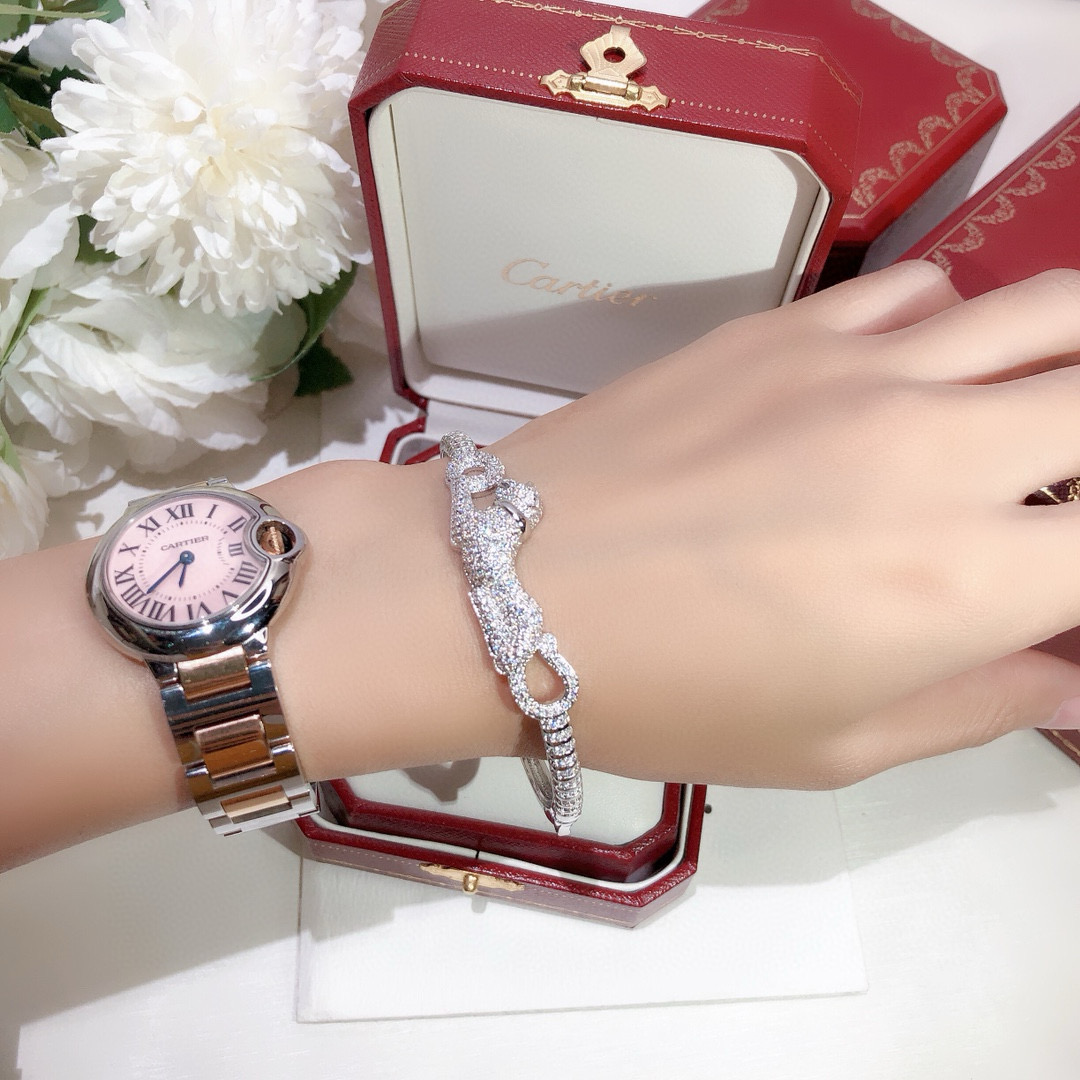 Cartier Panthere de Cartier bracelet 18K white gold pave diamonds tsavorite garnet eyes black onyx nose 17