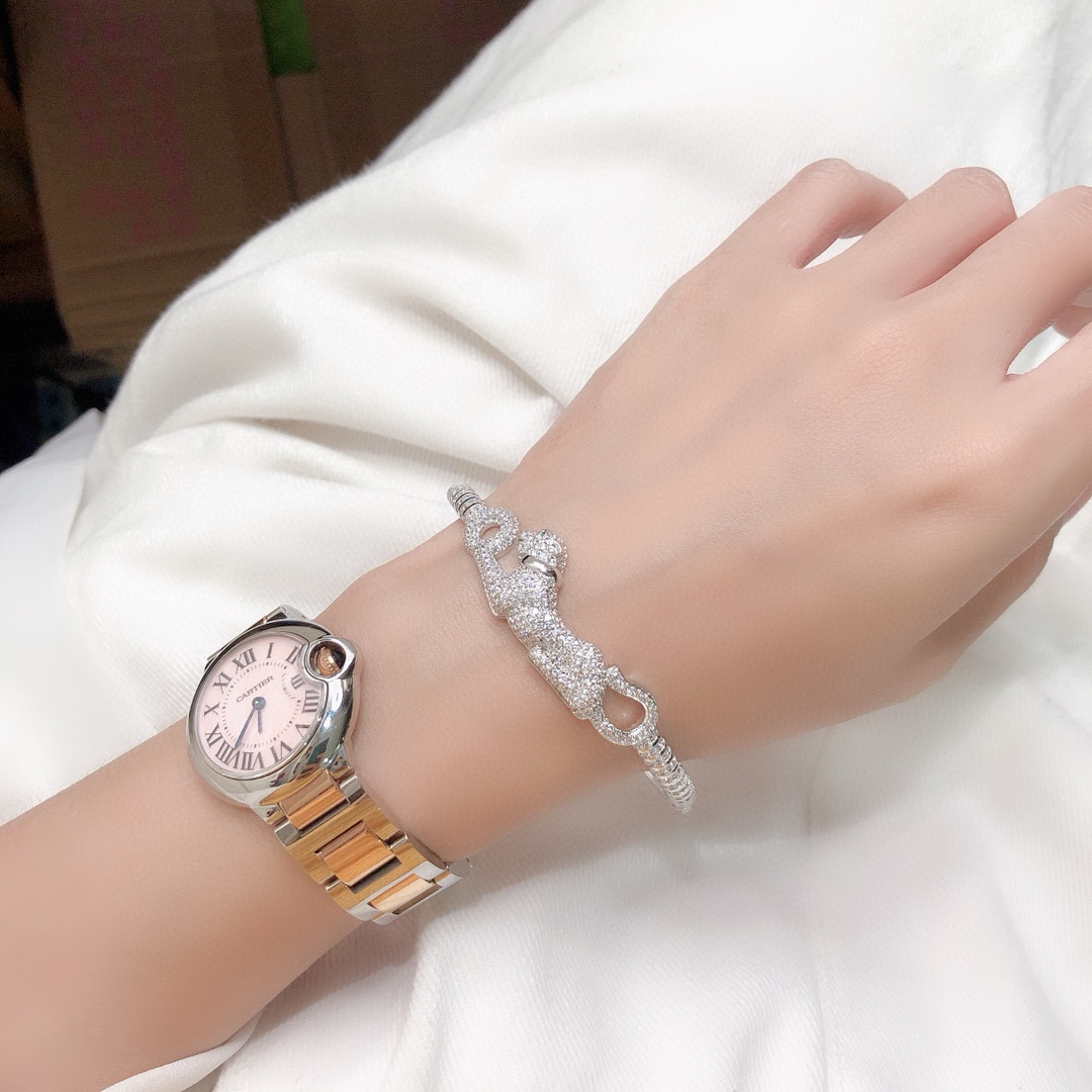 Cartier Panthere de Cartier bracelet 18K white gold pave diamonds tsavorite garnet eyes black onyx nose 17