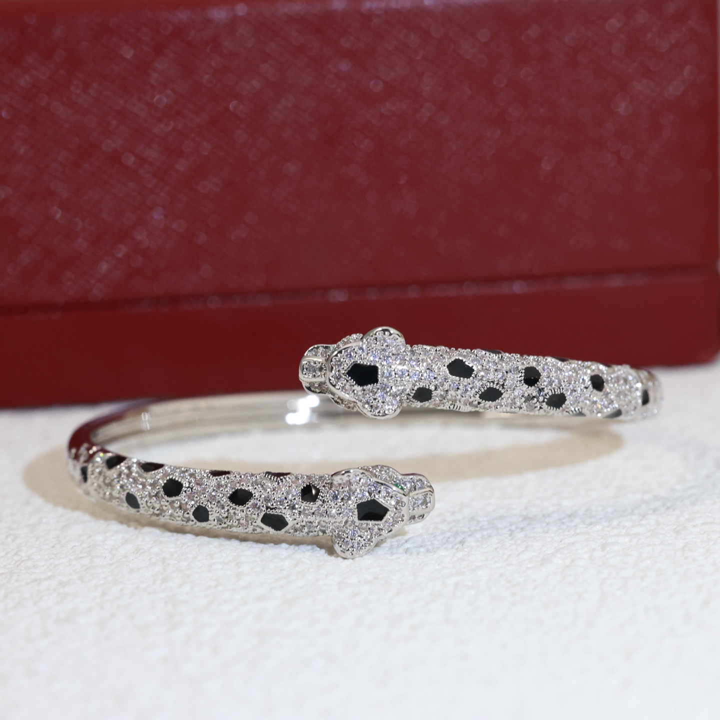 Cartier Panthere de Cartier bracelet 18K yellow gold paved with diamonds black onyx spots emerald eyes 17