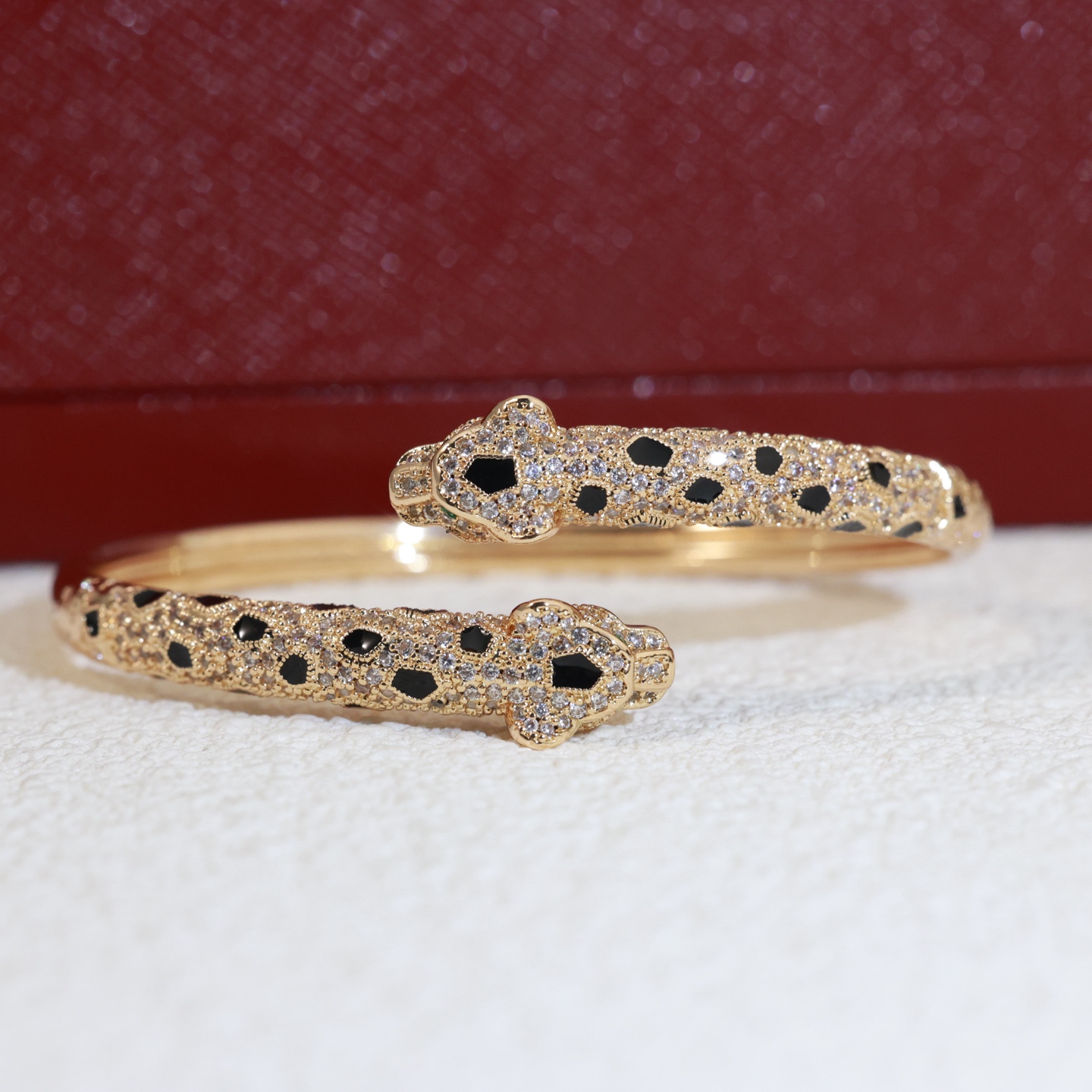 Cartier Panthere de Cartier bracelet 18K yellow gold paved with diamonds black onyx spots emerald eyes 17