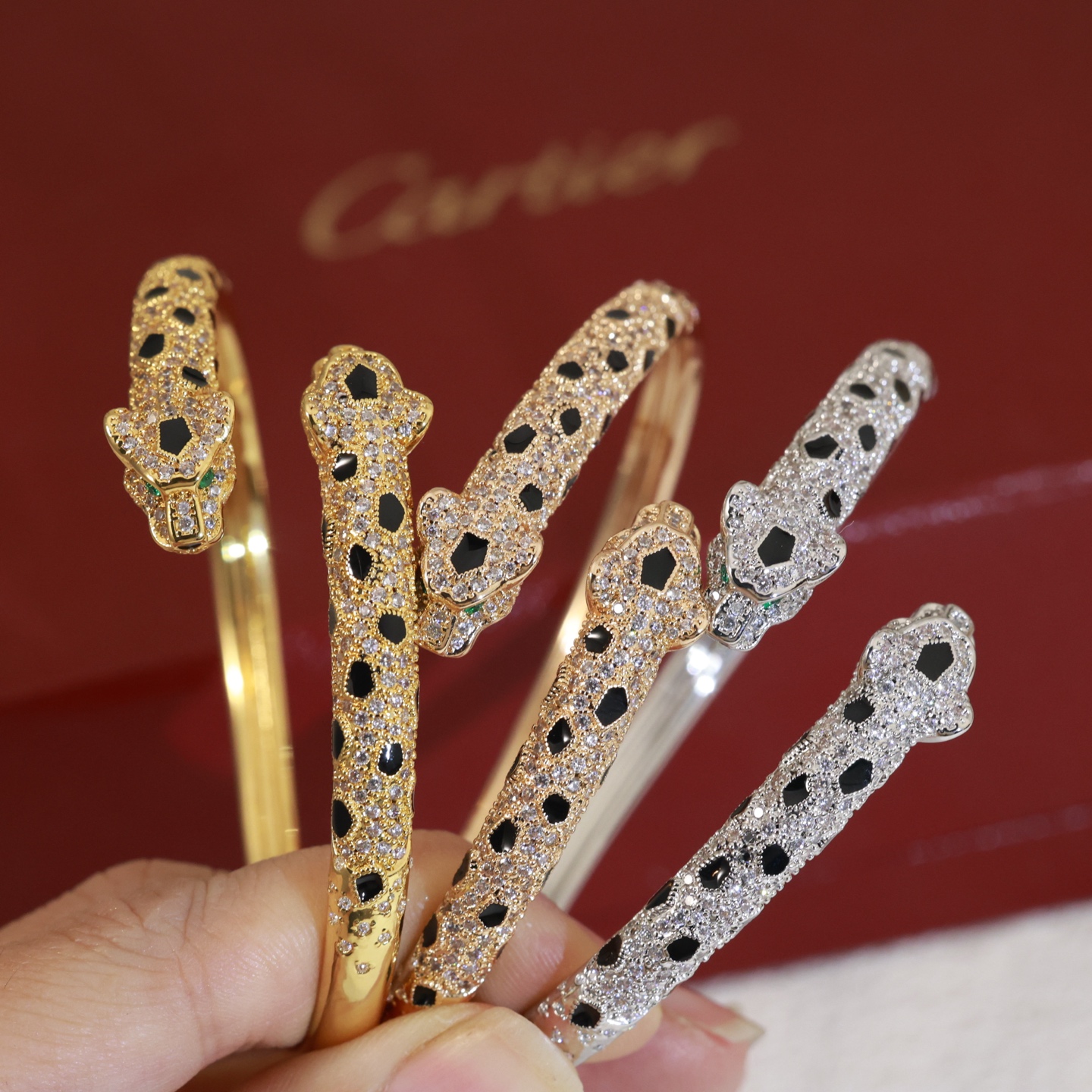 Cartier Panthere de Cartier bracelet 18K yellow gold paved with diamonds black onyx spots emerald eyes 17