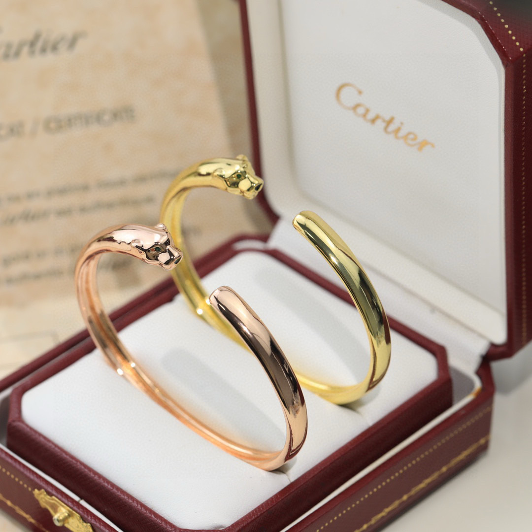 Cartier Panthere de Cartier bracelet 18K white gold 18K yellow gold 18K rose gold green tsavorite garnet eyes black onyx nose accents 17