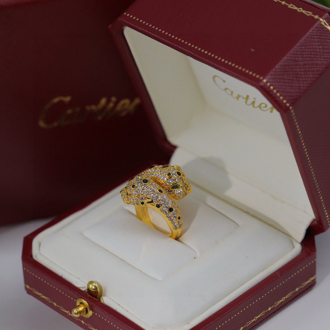 Cartier Panthere de Cartier ring 18K yellow gold pave set clear diamonds black onyx spots green tsavorite garnet eyes US 7