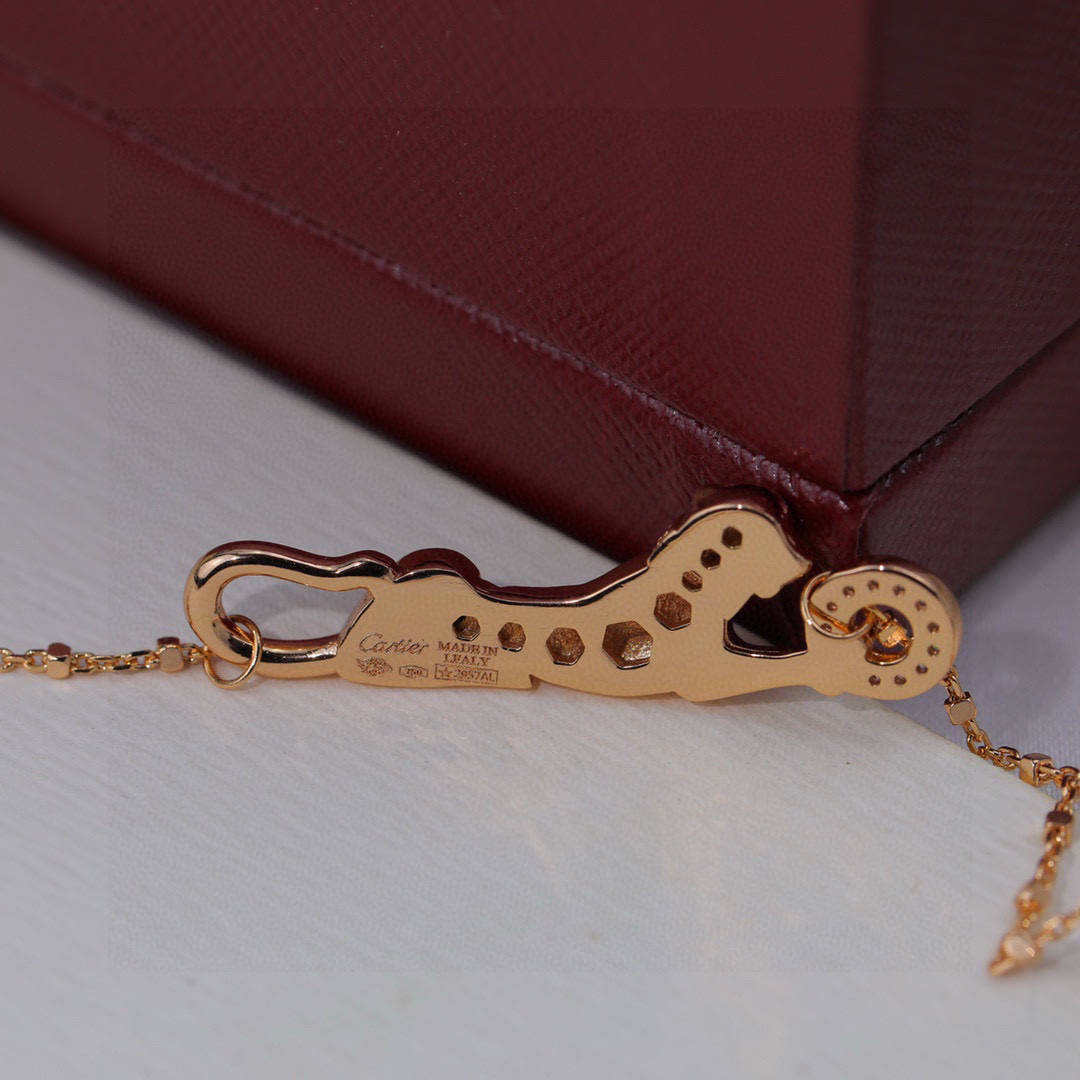 Cartier Panthere de Cartier necklace Rose gold with black onyx spots diamond accents green tsavorite garnet eyes 42cm