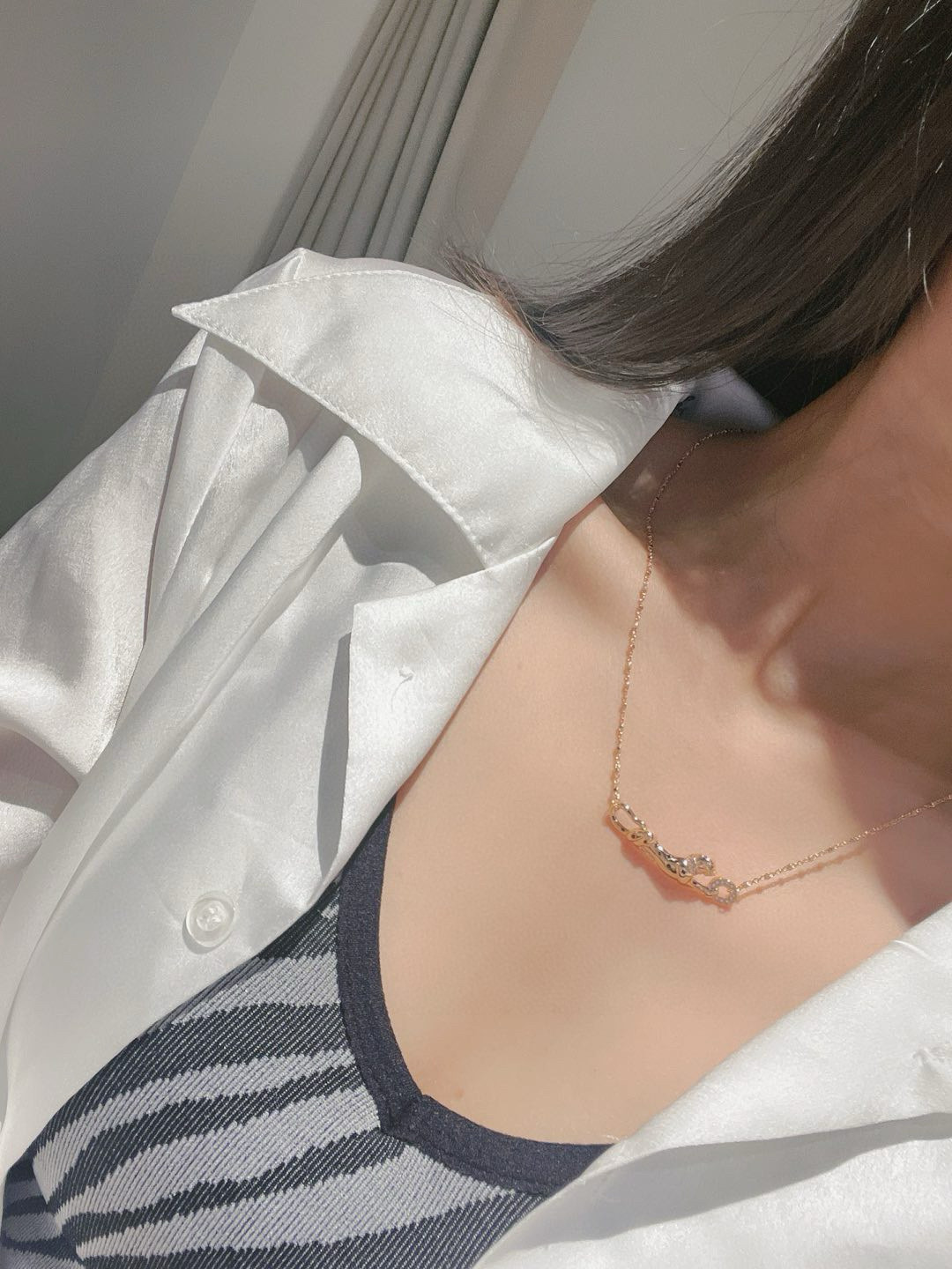 Cartier Panthere de Cartier necklace Rose gold with black onyx spots diamond accents green tsavorite garnet eyes 42cm