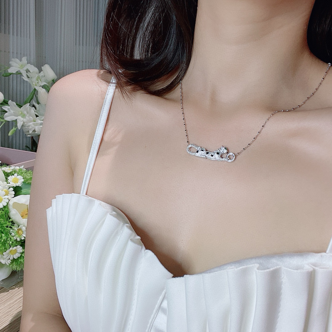 Cartier Panthere de Cartier necklace 18k yellow gold 18k rose gold 18k white gold with pave diamonds black onyx spots emerald panther eyes 42cm