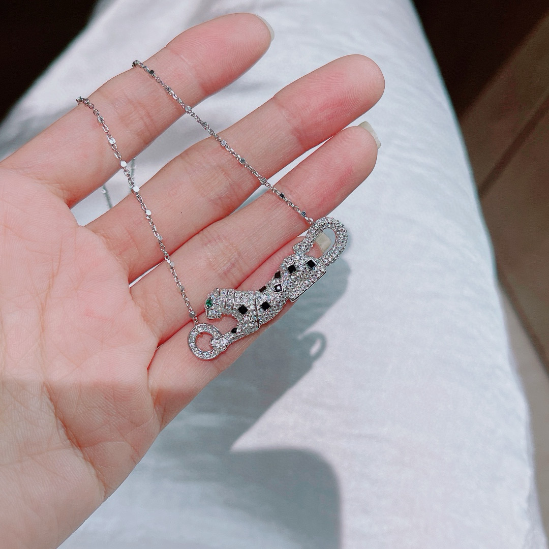 Cartier Panthere de Cartier necklace 18k yellow gold 18k rose gold 18k white gold with pave diamonds black onyx spots emerald panther eyes 42cm