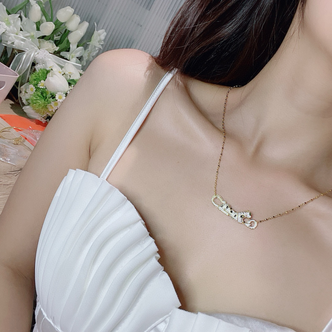 Cartier Panthere de Cartier necklace 18k yellow gold 18k rose gold 18k white gold with pave diamonds black onyx spots emerald panther eyes 42cm
