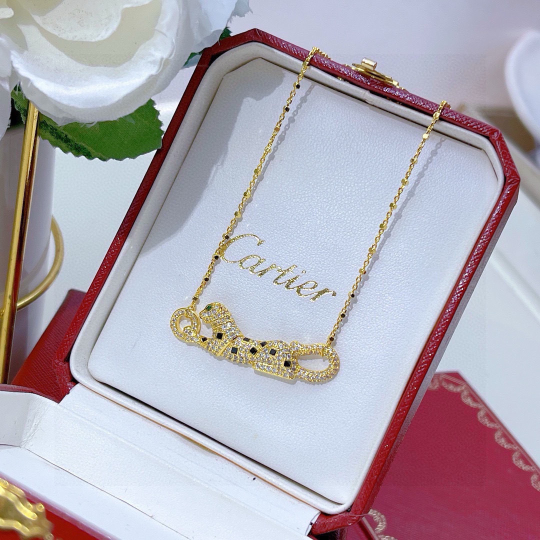 Cartier Panthere de Cartier necklace 18k yellow gold 18k rose gold 18k white gold with pave diamonds black onyx spots emerald panther eyes 42cm