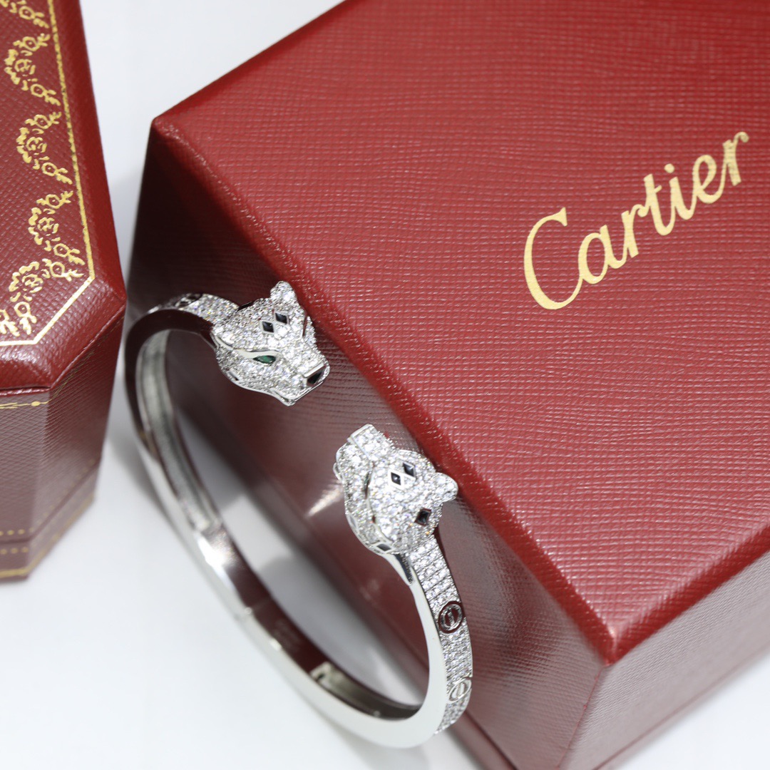 Cartier Panthere de Cartier bracelet 18K yellow gold set with diamonds black onyx green emerald 17