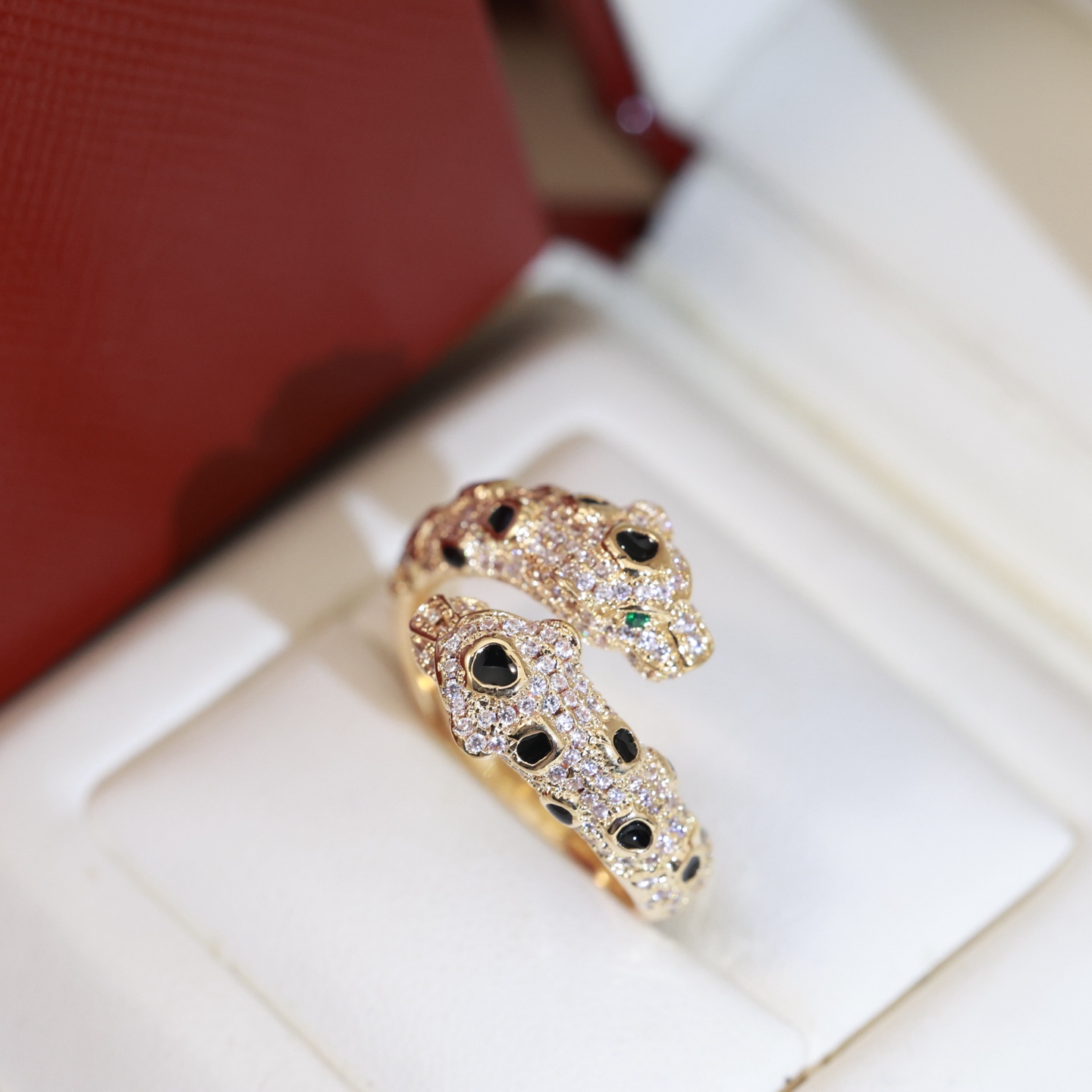 Cartier Panthere de Cartier ring 18K rose gold 18K yellow gold 18K white gold colorless diamonds black onyx tsavorite garnet US 7
