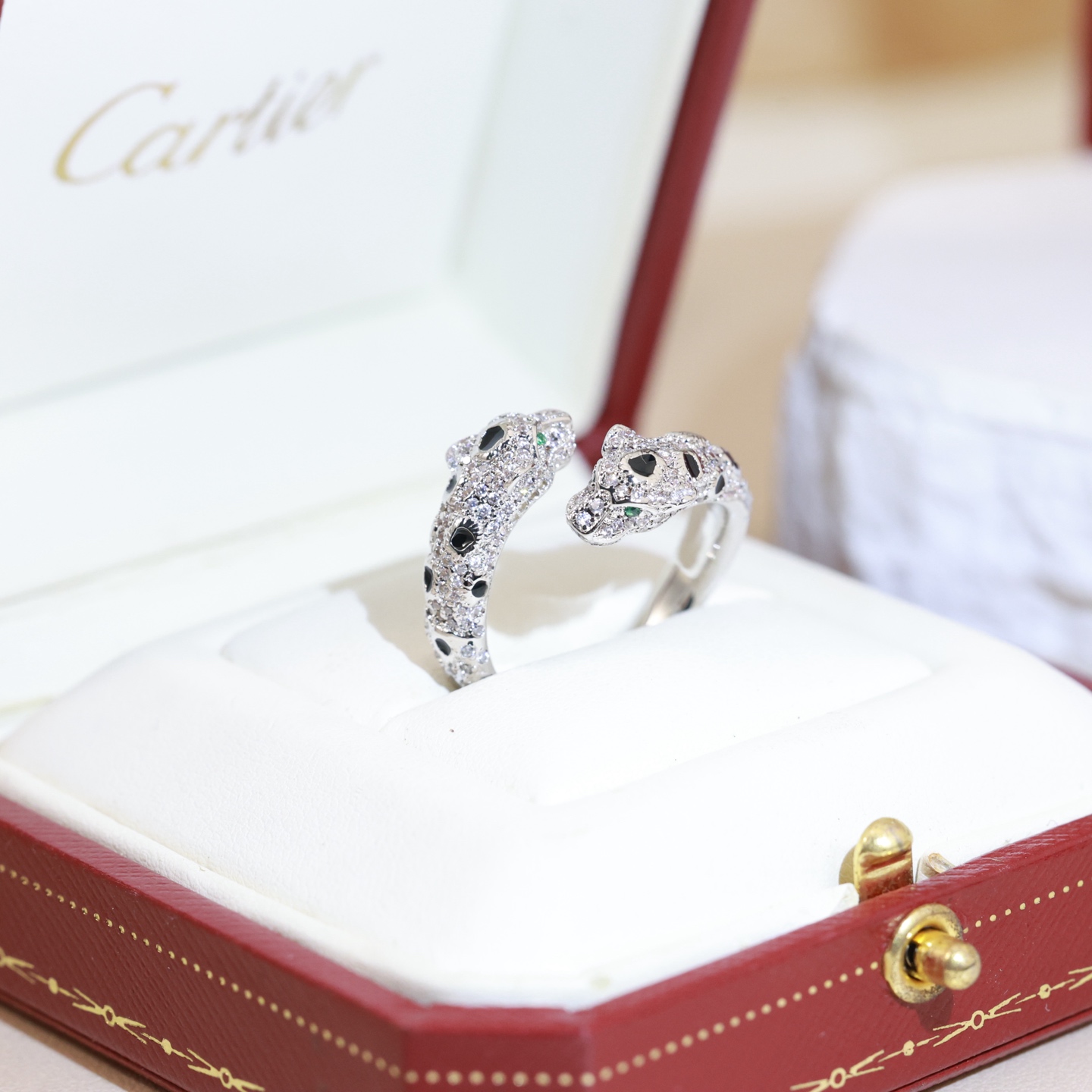 Cartier Panthere de Cartier ring 18K rose gold 18K yellow gold 18K white gold colorless diamonds black onyx tsavorite garnet US 7