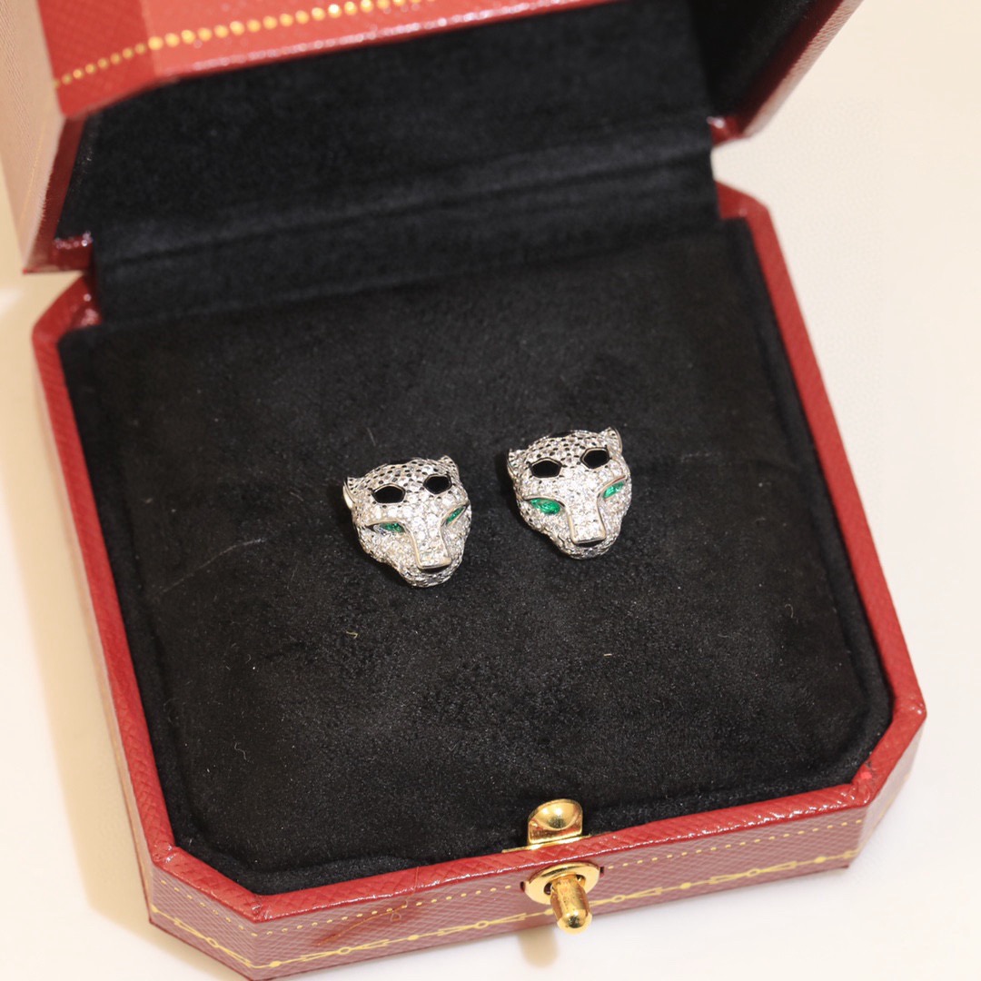 Cartier Panthere de Cartier earrings 18k yellow gold clear pave diamonds black onyx spots emerald green eyes 10mm stud length