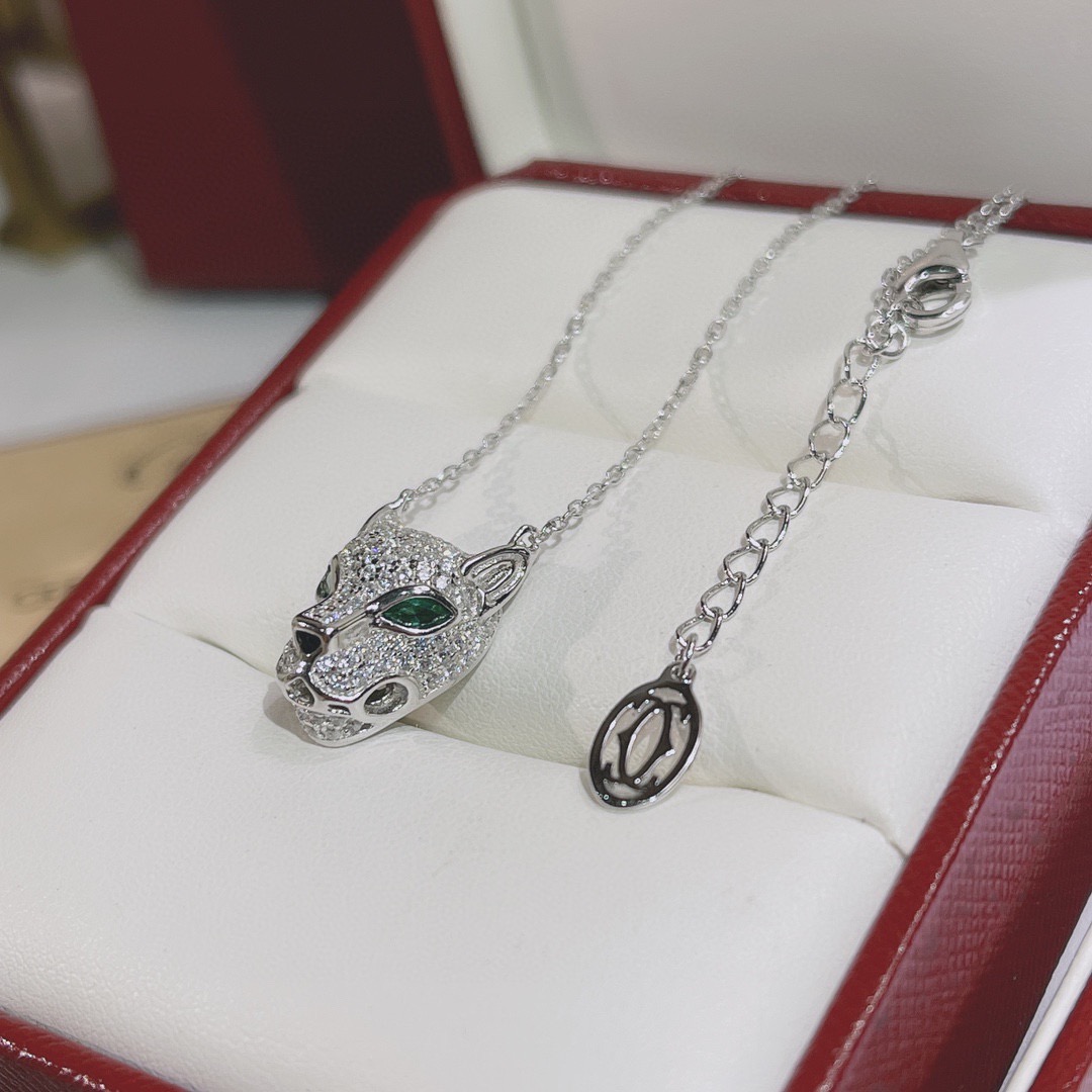 Cartier Panthere de Cartier necklace Available in yellow gold rose gold white gold set with pave diamonds green gemstone eyes black onyx nose detail 40-45cm