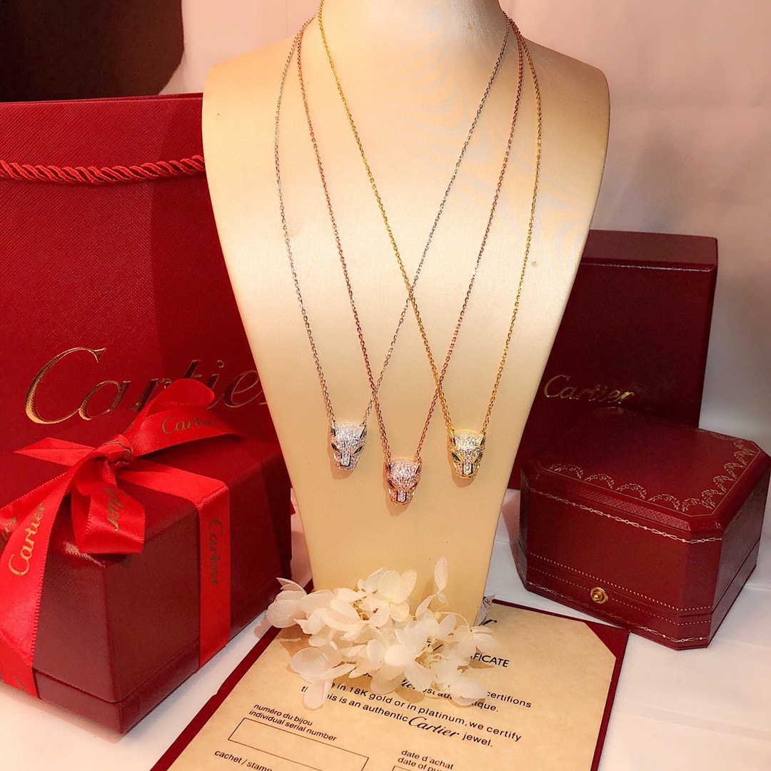 Cartier Panthere de Cartier necklace Available in yellow gold rose gold white gold set with pave diamonds green gemstone eyes black onyx nose detail 40-45cm