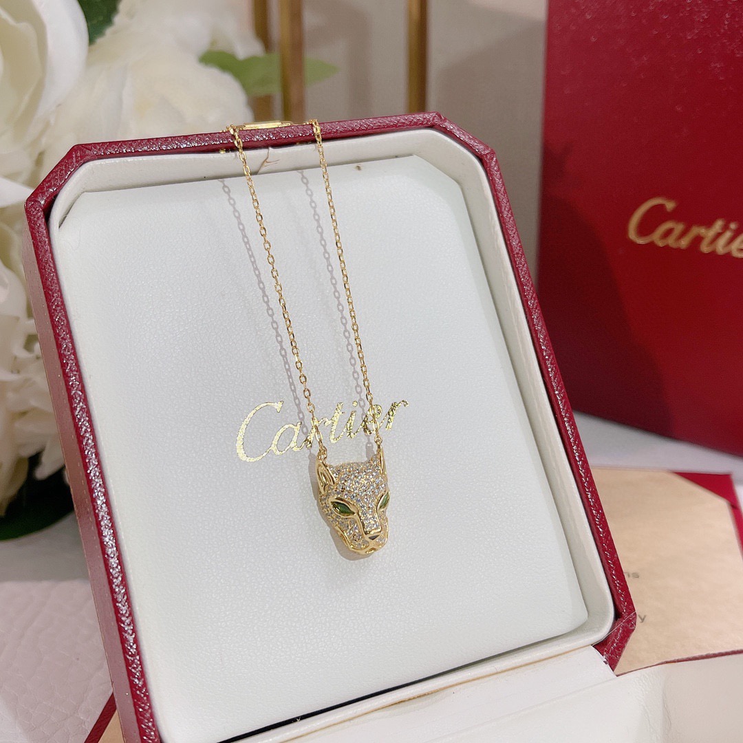 Cartier Panthere de Cartier necklace Available in yellow gold rose gold white gold set with pave diamonds green gemstone eyes black onyx nose detail 40-45cm