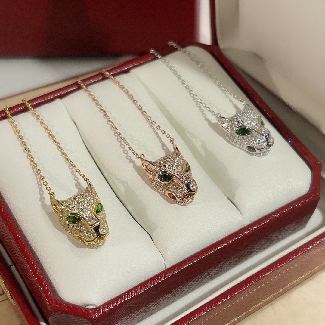 Cartier Panthere de Cartier necklace Available in yellow gold rose gold white gold set with pave diamonds green gemstone eyes black onyx nose detail 40-45cm