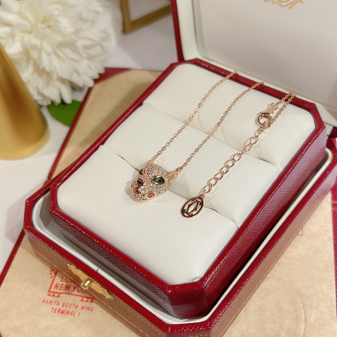 Cartier Panthere de Cartier necklace Available in yellow gold rose gold white gold set with pave diamonds green gemstone eyes black onyx nose detail 40-45cm