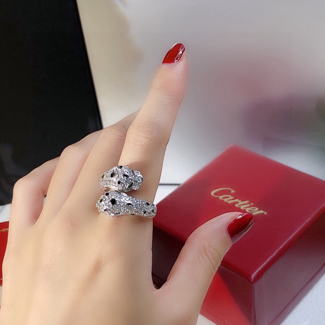 Cartier Panthere de Cartier ring 18K white gold pave diamonds black onyx spots tsavorite garnet eyes US 7