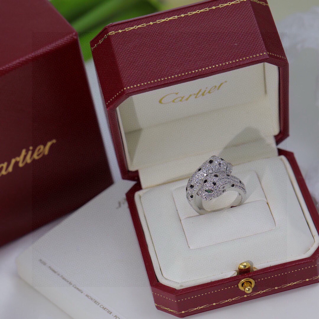 Cartier Panthere de Cartier ring 18K white gold pave diamonds black onyx spots tsavorite garnet eyes US 7