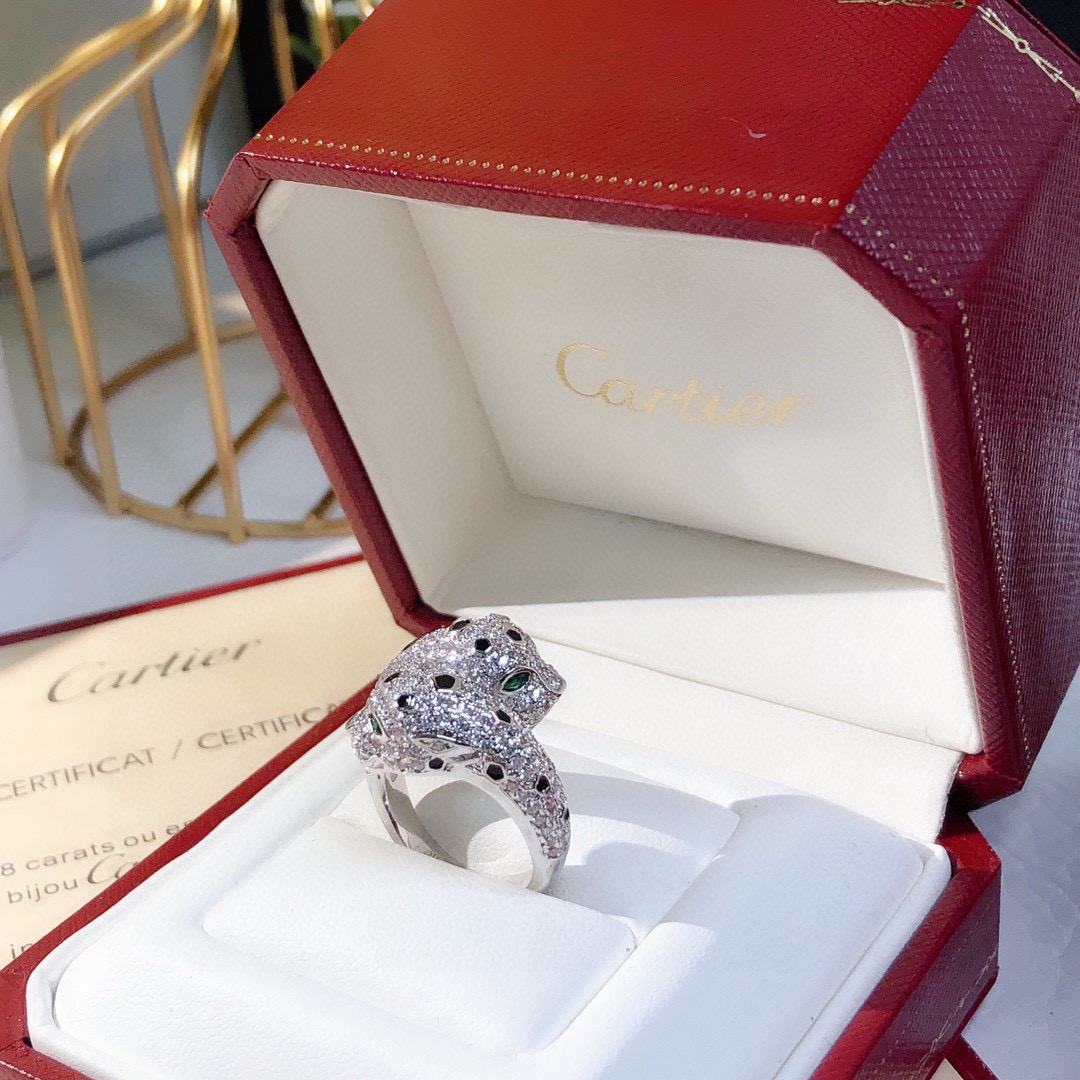 Cartier Panthere de Cartier ring 18K white gold pave diamonds black onyx spots tsavorite garnet eyes US 7