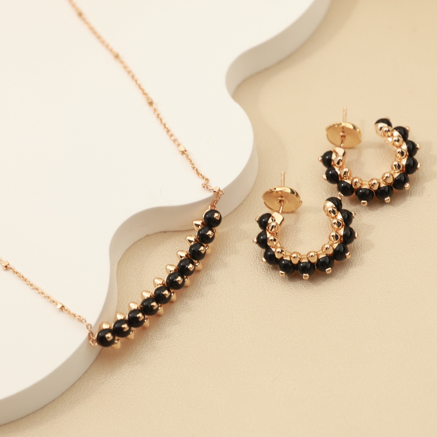 Cartier Clash de Cartier earrings rose gold metal with black onyx cabochons 14mm outer hoop diameter