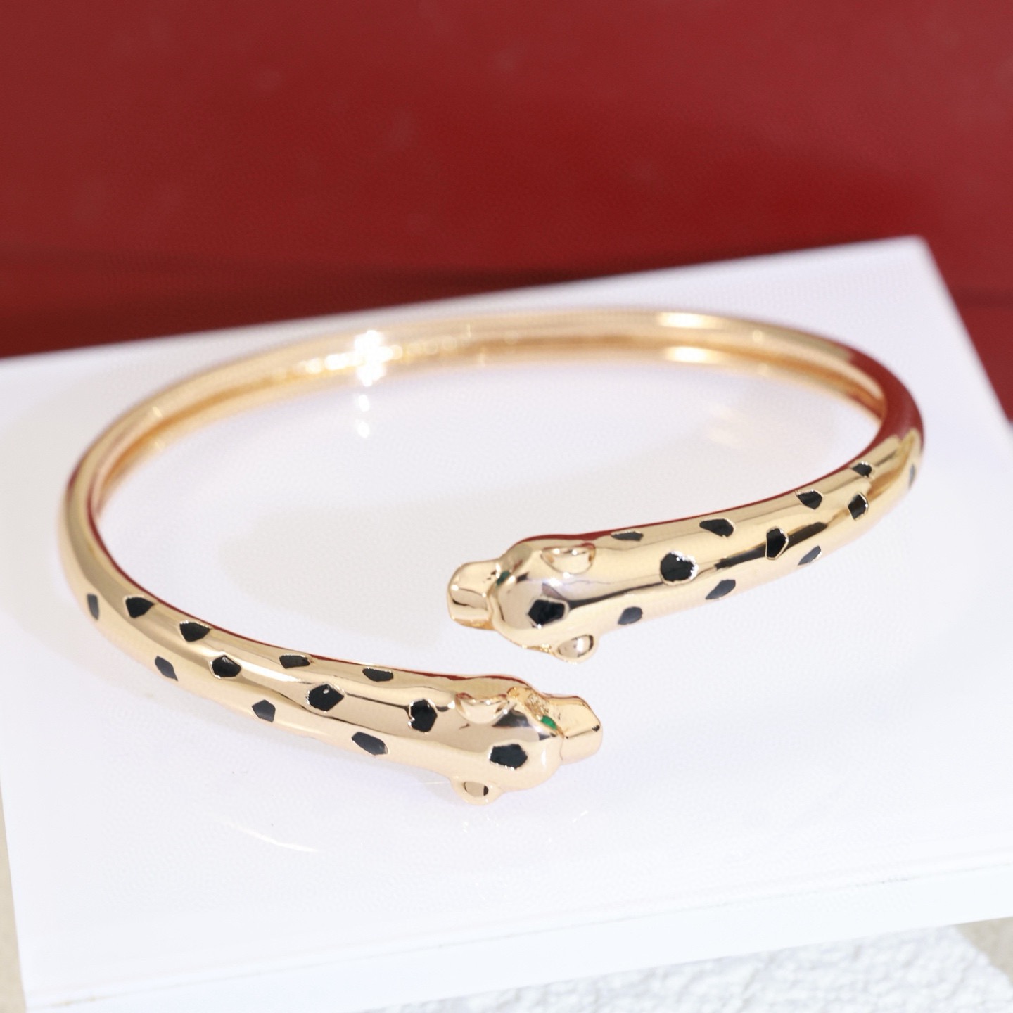 Cartier Panthere de Cartier bracelet 18K rose gold with black lacquer panther spots 17