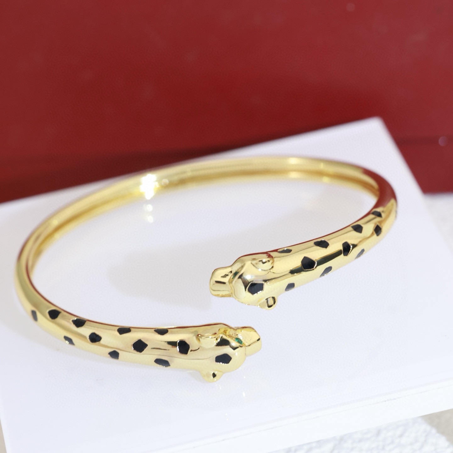 Cartier Panthere de Cartier bracelet 18K rose gold with black lacquer panther spots 17
