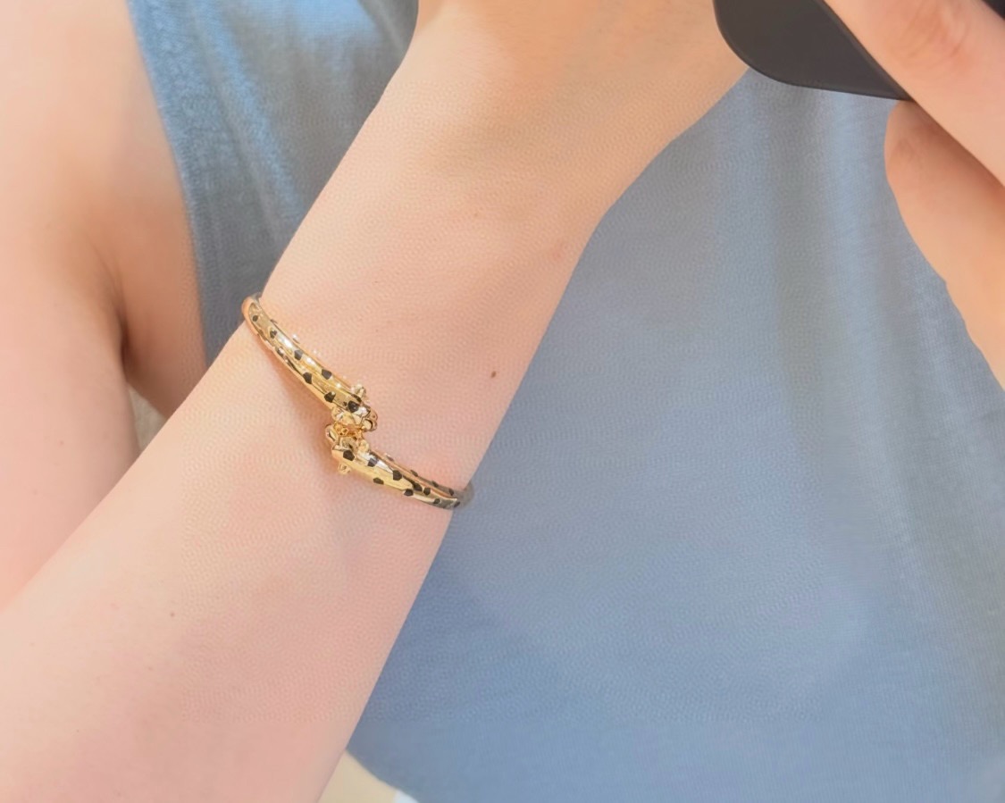 Cartier Panthere de Cartier bracelet 18K rose gold with black lacquer panther spots 17