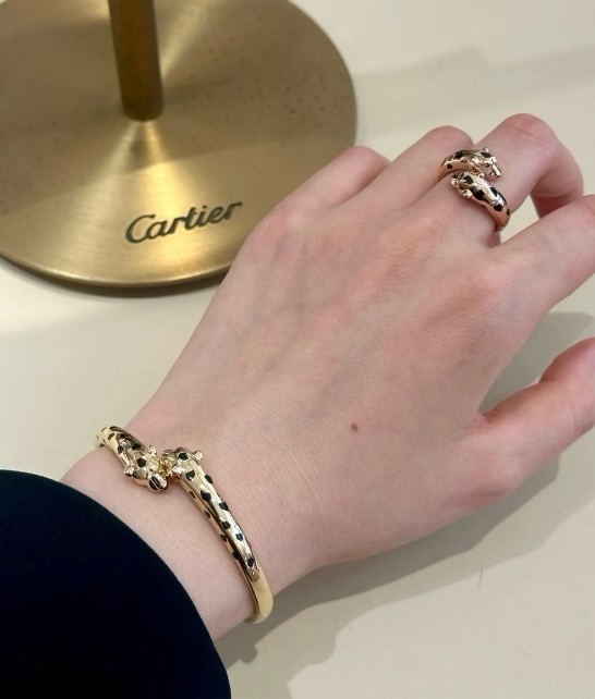 Cartier Panthere de Cartier bracelet 18K rose gold with black lacquer panther spots 17
