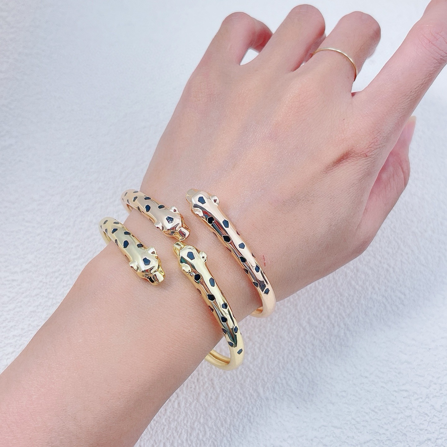 Cartier Panthere de Cartier bracelet 18K rose gold with black lacquer panther spots 17