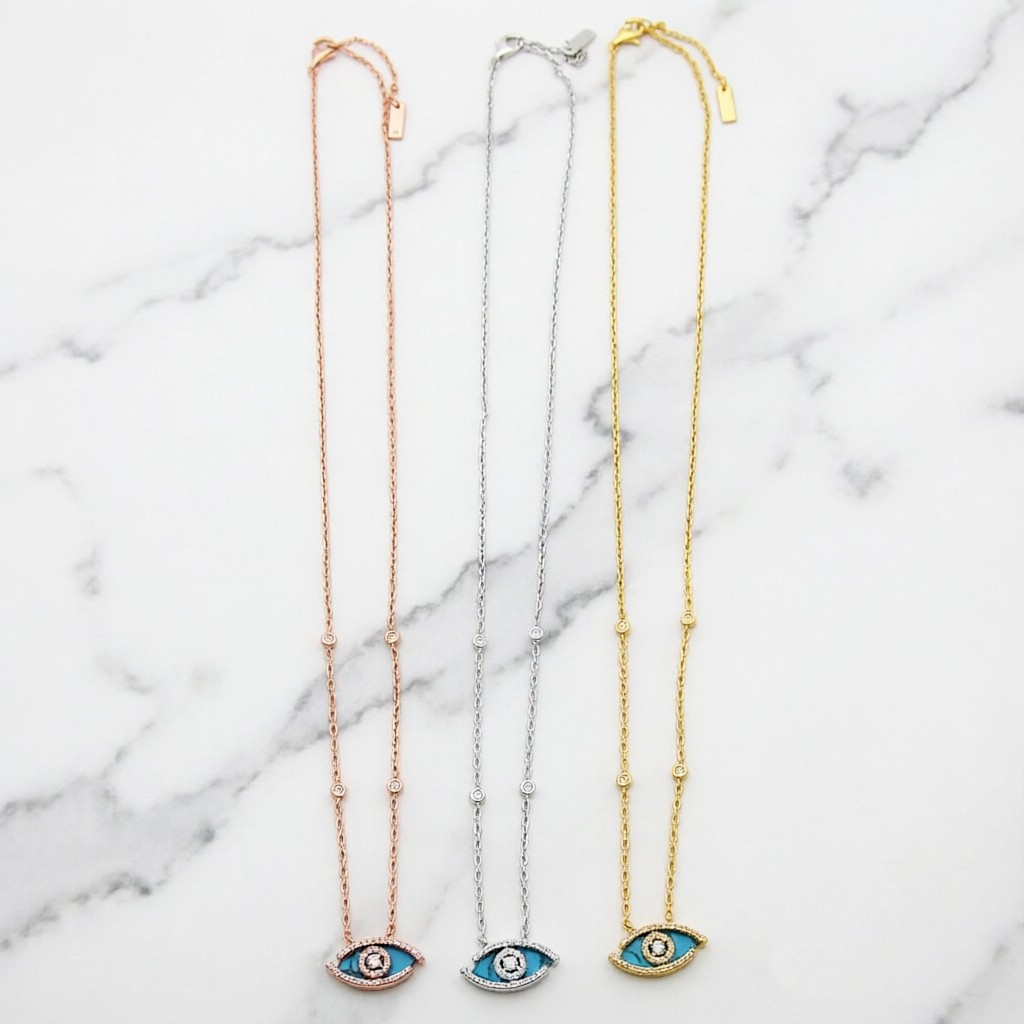Messika Lucky Eye Evil Eye Pendant Necklace necklace Available in 18k rose gold 18k white gold 18k yellow gold set with malachite or turquoise accented with pave diamonds and a central diamond 42cm with 5cm extender
