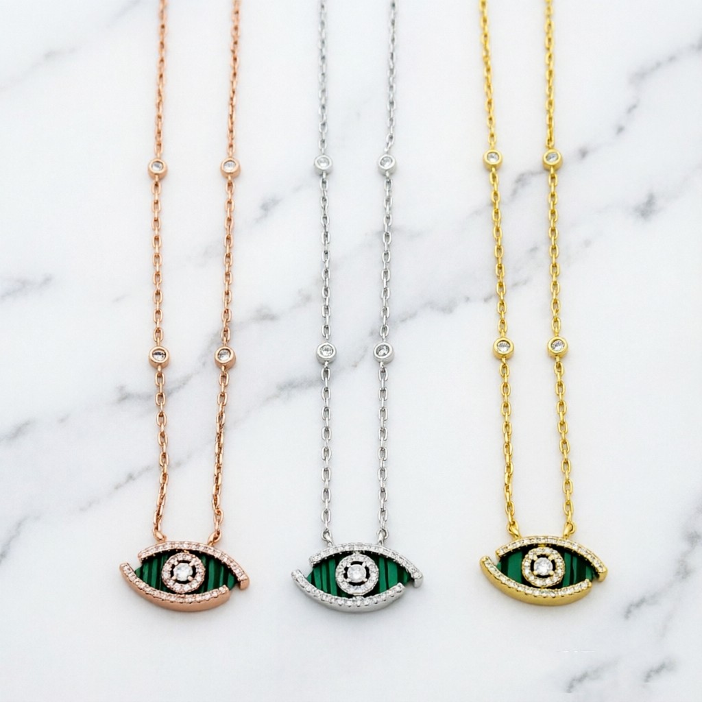 Messika Lucky Eye Evil Eye Pendant Necklace necklace Available in 18k rose gold 18k white gold 18k yellow gold set with malachite or turquoise accented with pave diamonds and a central diamond 42cm with 5cm extender