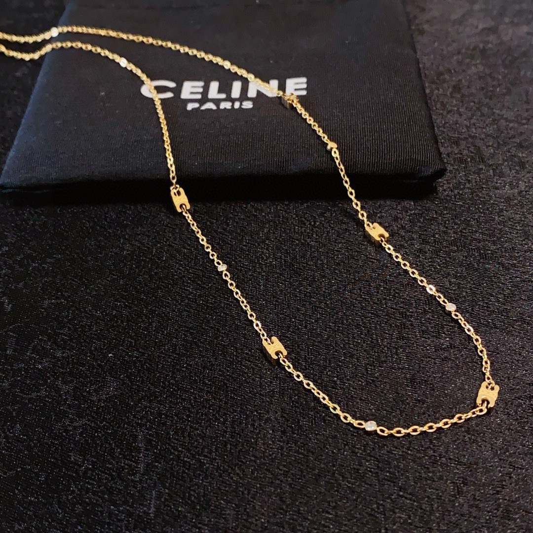 Celine Triomphe Mini Charms necklace gold-tone metal with clear crystal accents 40cm