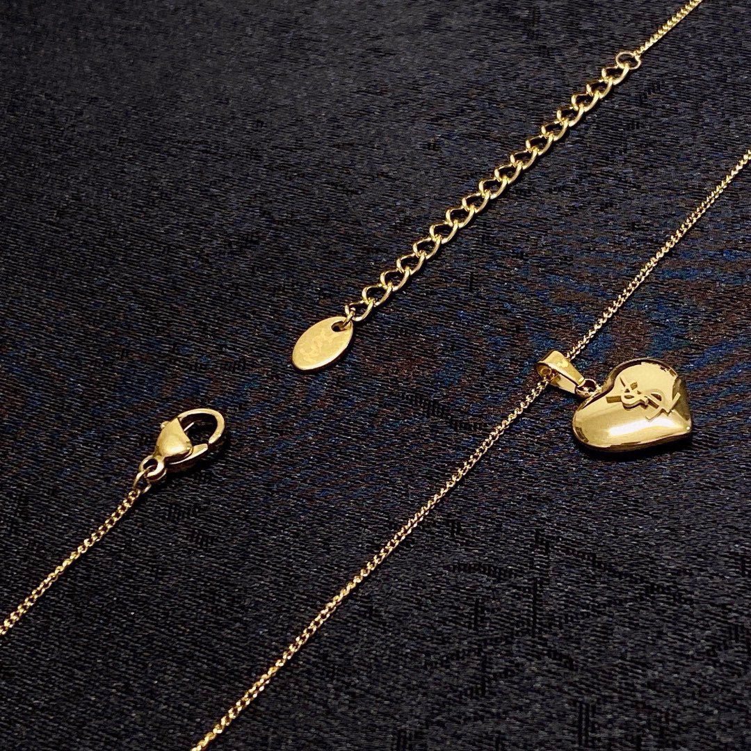 Saint Laurent 1961 YSL Heart Pendant necklace gold tone metal 40cm with 5cm extender